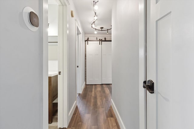 303 E Xy Ave, Vicksburg, MI 49097 - hallway with wood finished floors and baseboards