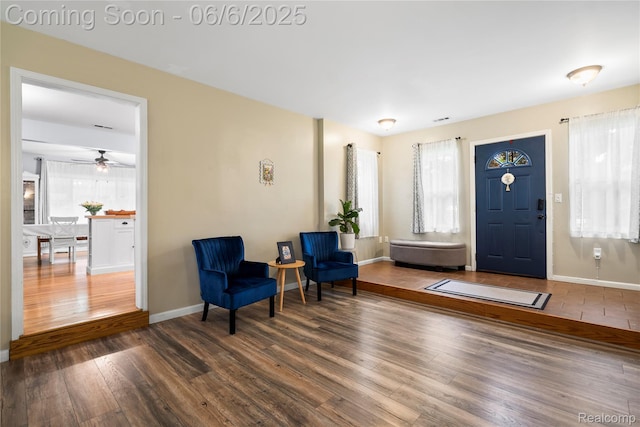 6226 Rowley Blvd, Waterford, MI 48329 - foyer featuring wood finished floors, baseboards, and ceiling fan
