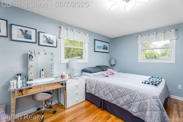 9744 Pere Ave, Livonia, MI 48150 - bedroom with light wood finished floors and baseboards
