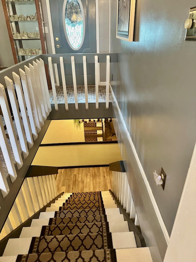 558 Terry St, Muskegon, MI 49442 - stairs with wood finished floors