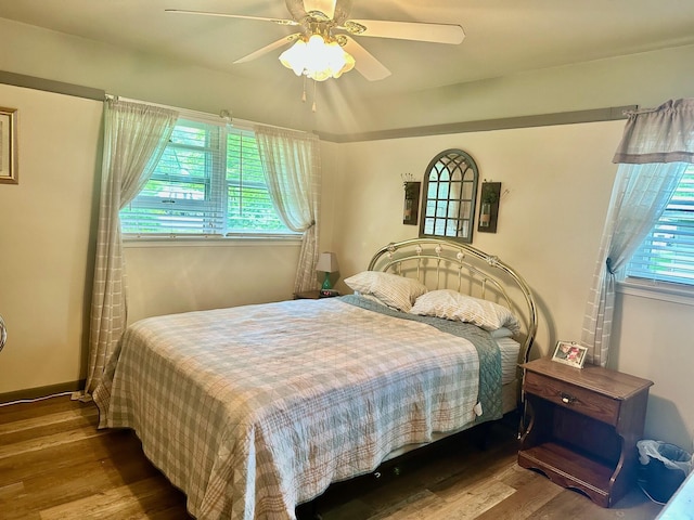 558 Terry St, Muskegon, MI 49442 - bedroom featuring wood finished floors and a ceiling fan