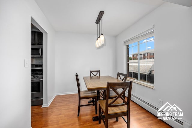 2203 Porter St SW Unit 104, Wyoming, MI 49519 - dining room with wood finished floors and baseboards