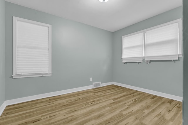 20241 Braile St, Detroit, MI 48219 - spare room with baseboards and light wood-style flooring