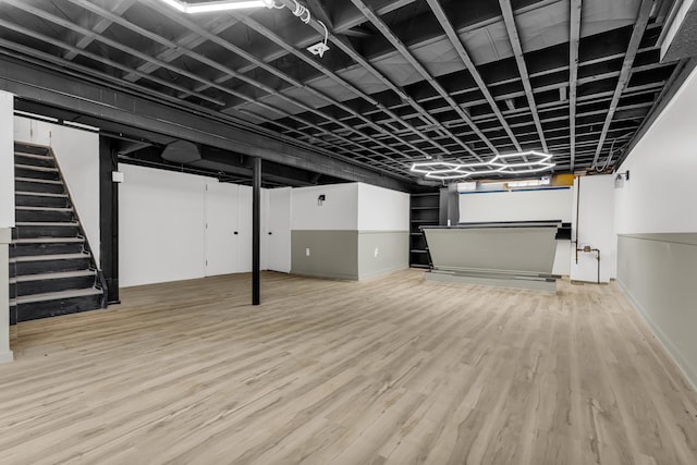 20241 Braile St, Detroit, MI 48219 - below grade area featuring wood finished floors and stairway