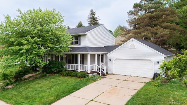 1755 Country View Dr, Okemos, MI 48864 - view of front of property with a porch, an attached garage, a front lawn, driveway, and roof with shingles