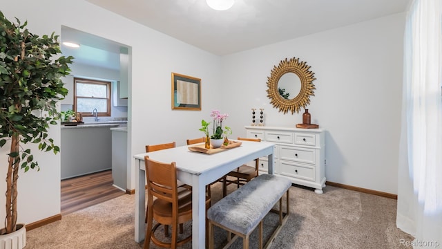 1755 Country View Dr, Okemos, MI 48864 - dining area with light colored carpet and baseboards