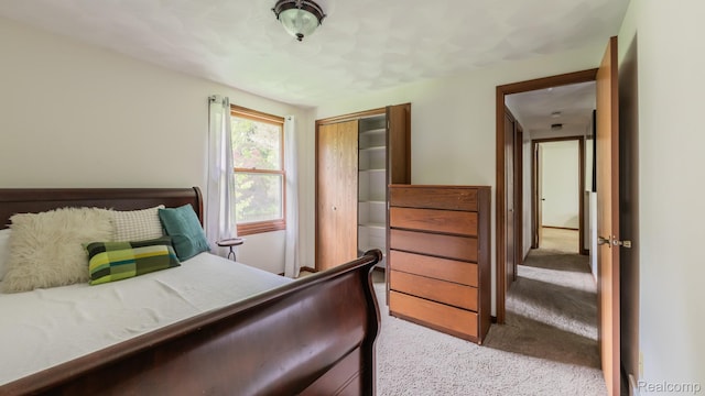 1755 Country View Dr, Okemos, MI 48864 - carpeted bedroom featuring a closet