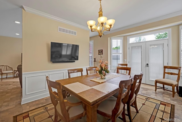 59649 Mallory Ln, South Lyon, MI 48178 - dining area with a chandelier and ornamental molding