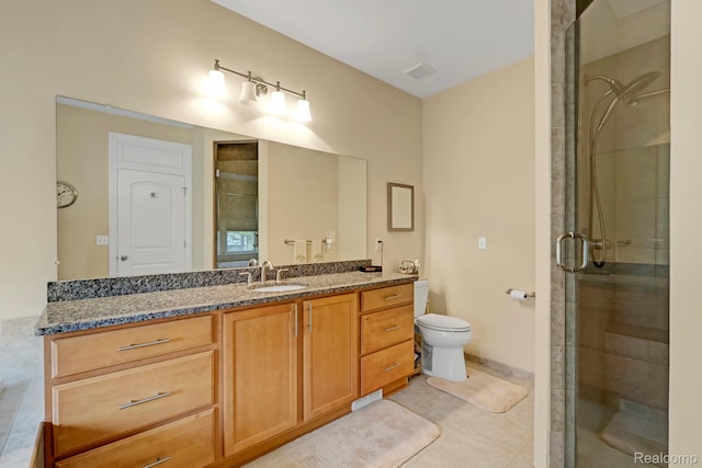 59649 Mallory Ln, South Lyon, MI 48178 - bathroom featuring a shower stall, vanity, toilet, and tile patterned floors