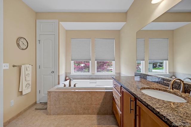 59649 Mallory Ln, South Lyon, MI 48178 - bathroom featuring healthy amount of natural light, a bath, vanity, and tile patterned flooring