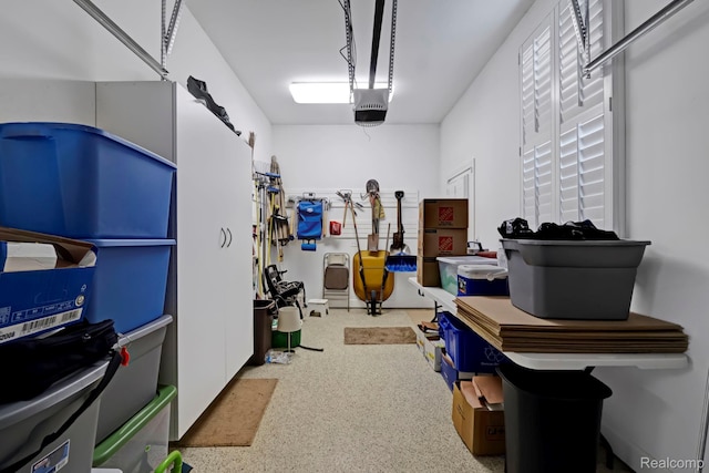 59649 Mallory Ln, South Lyon, MI 48178 - garage featuring a garage door opener