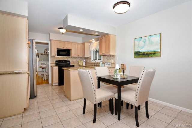 6835 Limerick Ln, Troy, MI 48098 - dining room featuring light tile patterned flooring, recessed lighting, and baseboards