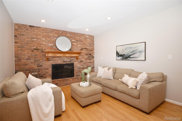 6835 Limerick Ln, Troy, MI 48098 - living area with light wood-style flooring, recessed lighting, baseboards, and a brick fireplace