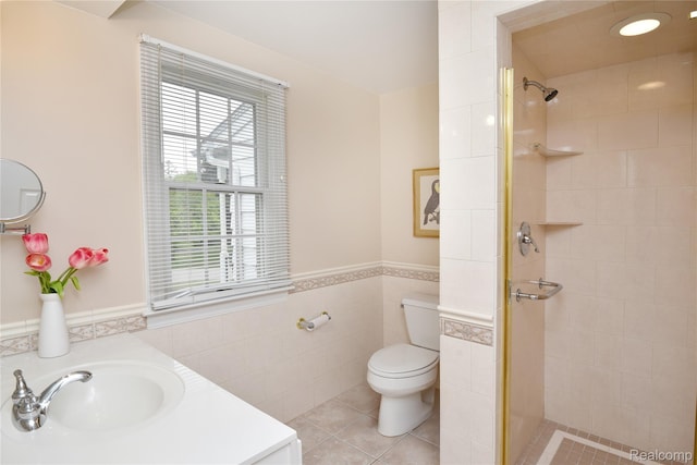 6835 Limerick Ln, Troy, MI 48098 - full bath featuring a shower stall, tile walls, vanity, tile patterned floors, and toilet