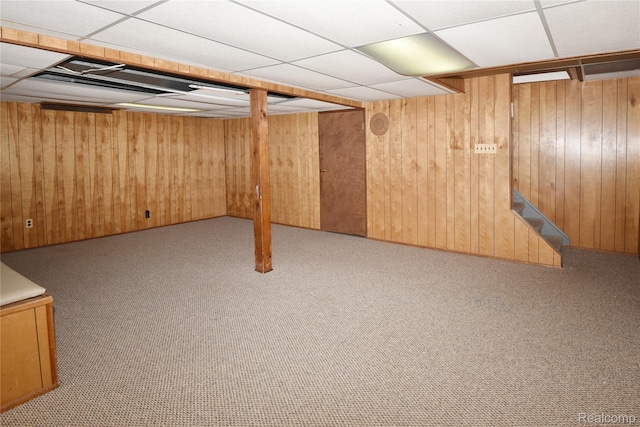 6835 Limerick Ln, Troy, MI 48098 - finished below grade area featuring a drop ceiling, wood walls, and carpet floors