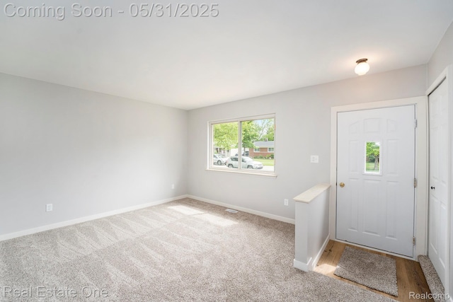 2809 Sparta Dr, Troy, MI 48083 - carpeted foyer with baseboards