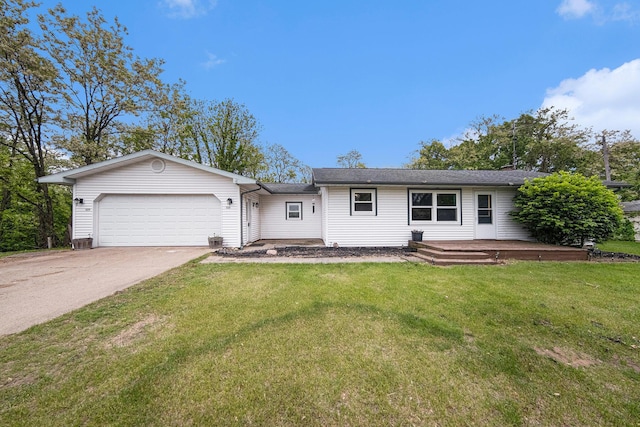 3225 Fishville Rd, Grass Lake, MI 49240 - ranch-style home with an attached garage, driveway, and a front lawn