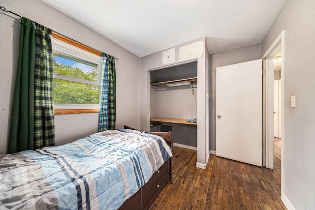 3225 Fishville Rd, Grass Lake, MI 49240 - bedroom with wood finished floors, baseboards, and a closet