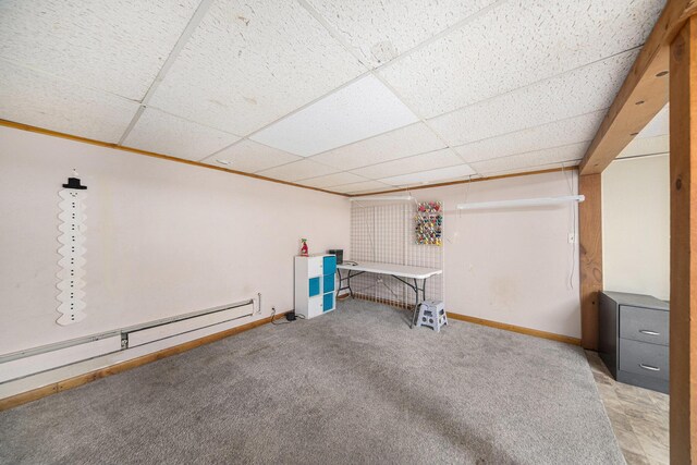 3225 Fishville Rd, Grass Lake, MI 49240 - unfurnished bedroom featuring a baseboard radiator, baseboards, a paneled ceiling, and carpet floors