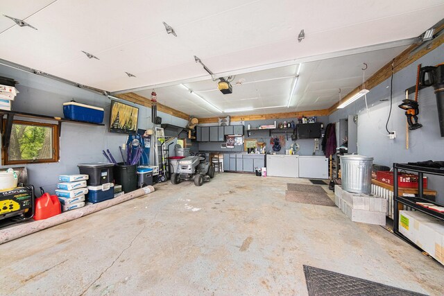3225 Fishville Rd, Grass Lake, MI 49240 - garage with a garage door opener