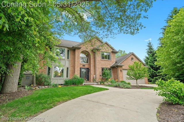 5182 Shady Creek Dr, Troy, MI 48085 - traditional home with brick siding and a front yard