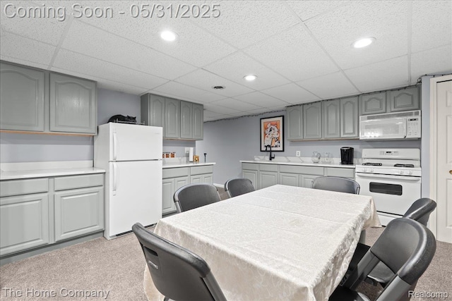 5182 Shady Creek Dr, Troy, MI 48085 - dining room featuring carpet flooring, a paneled ceiling, and recessed lighting