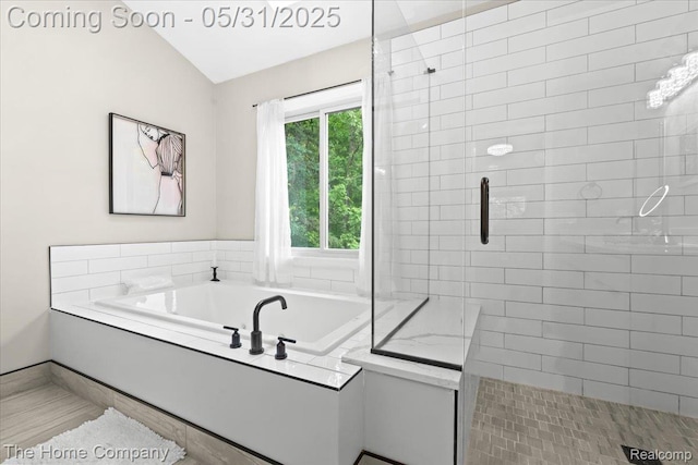 5182 Shady Creek Dr, Troy, MI 48085 - bathroom featuring a bath, tiled shower, and lofted ceiling