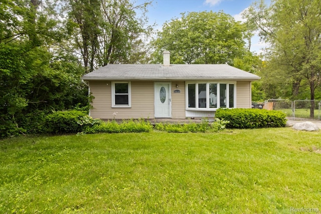 14134 Syracuse St, Southgate, MI 48180 - view of front facade with a chimney