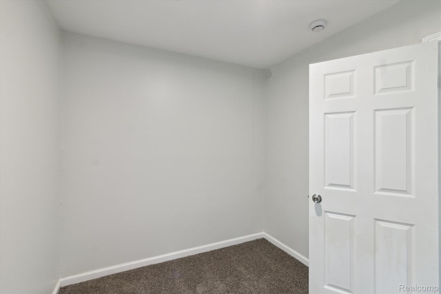 14134 Syracuse St, Southgate, MI 48180 - unfurnished room with dark carpet, a smoke detector, and baseboards