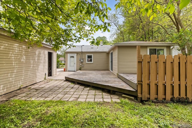 14134 Syracuse St, Southgate, MI 48180 - rear view of house with a deck and a patio