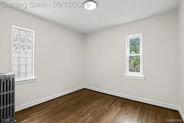 19143 San Juan Dr, Grosse Pointe, MI 48221 - spare room featuring wood finished floors and baseboards