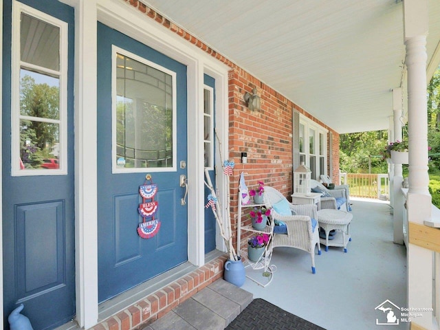 11963 Egan Hwy, Brooklyn, MI 49230 - entrance to property featuring a porch and brick siding