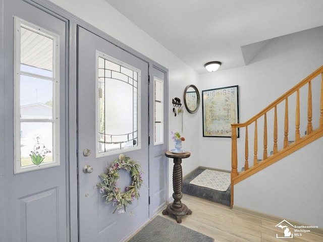 11963 Egan Hwy, Brooklyn, MI 49230 - foyer entrance with stairway and wood finished floors