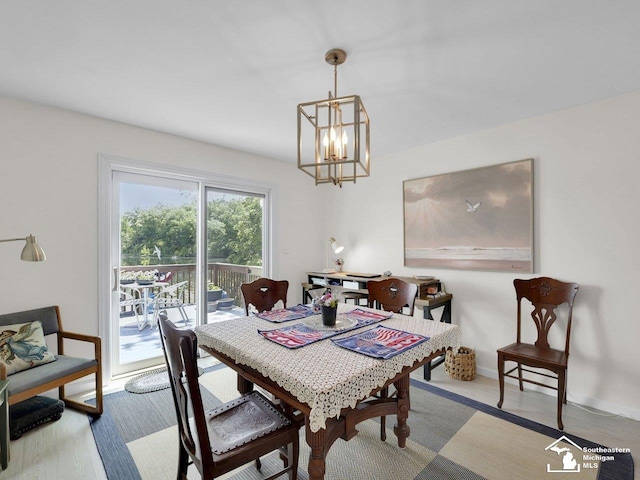 11963 Egan Hwy, Brooklyn, MI 49230 - dining area with a chandelier and baseboards