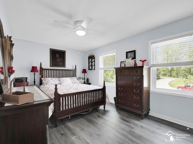 11963 Egan Hwy, Brooklyn, MI 49230 - bedroom with wood finished floors and a ceiling fan