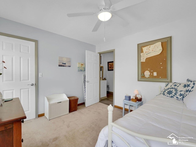 11963 Egan Hwy, Brooklyn, MI 49230 - bedroom with light colored carpet and a ceiling fan