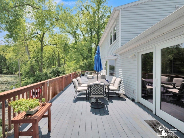 11963 Egan Hwy, Brooklyn, MI 49230 - wooden deck with outdoor dining area