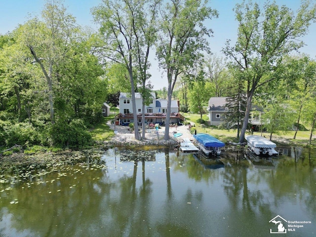 11963 Egan Hwy, Brooklyn, MI 49230 - dock area with a water view, boat lift, and view of wooded area