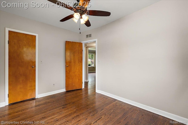 15501 Portis St, Northville, MI 48170 - empty room with ceiling fan, dark wood-type flooring, and baseboards