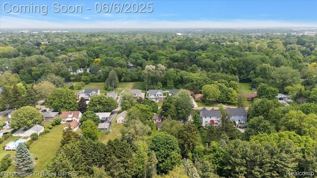 15501 Portis St, Northville, MI 48170 - aerial perspective of suburban area featuring a forest
