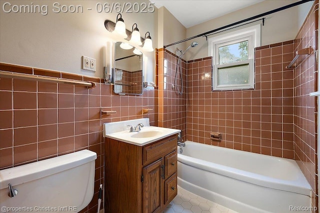 15501 Portis St, Northville, MI 48170 - full bath with toilet, bathtub / shower combination, vanity, tile walls, and tile patterned flooring