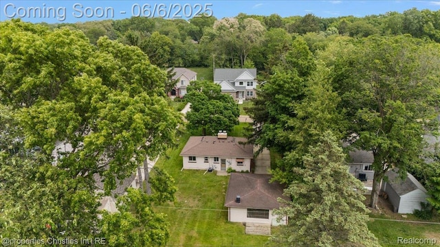15501 Portis St, Northville, MI 48170 - aerial view of a heavily wooded area