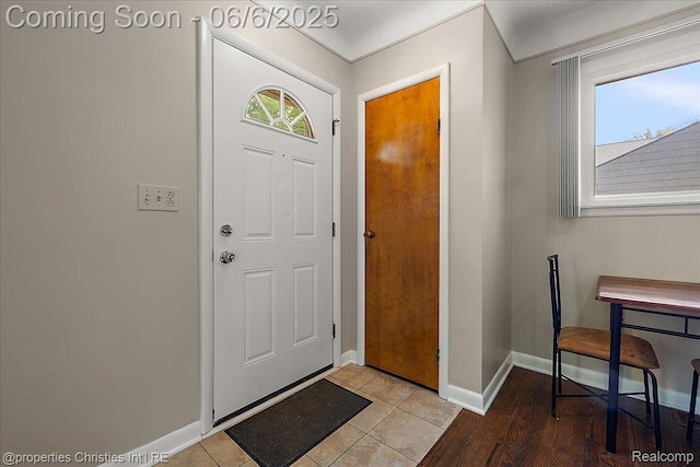 15501 Portis St, Northville, MI 48170 - entryway with baseboards and light tile patterned floors