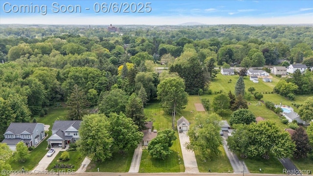 15501 Portis St, Northville, MI 48170 - aerial perspective of suburban area with a forest