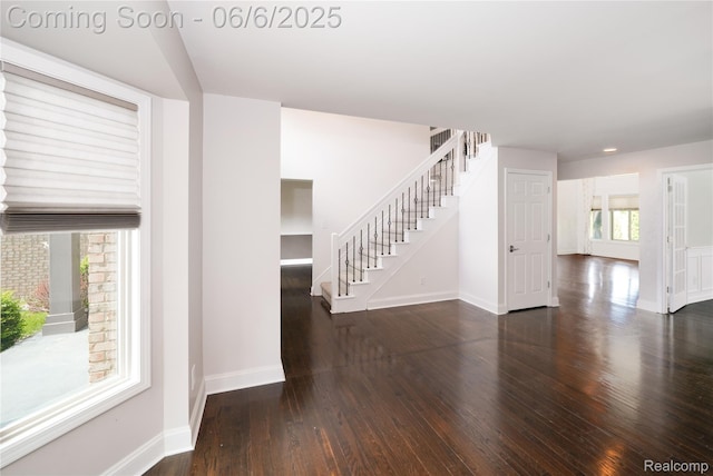 42105 Dorchester Ct, Clinton Township, MI 48038 - foyer entrance featuring stairs, wood finished floors, and baseboards