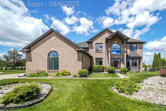 42105 Dorchester Ct, Clinton Township, MI 48038 - view of front facade with brick siding