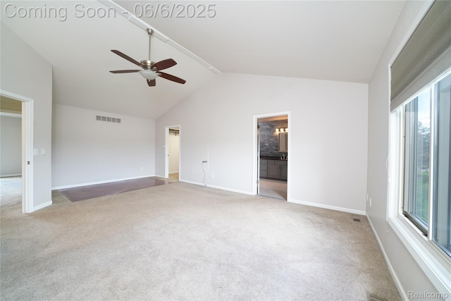 42105 Dorchester Ct, Clinton Township, MI 48038 - unfurnished room featuring a ceiling fan, plenty of natural light, vaulted ceiling, light colored carpet, and baseboards