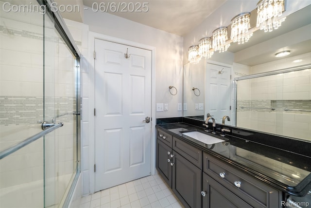 42105 Dorchester Ct, Clinton Township, MI 48038 - bathroom featuring vanity, tile patterned flooring, shower / bath combination with glass door, and a chandelier
