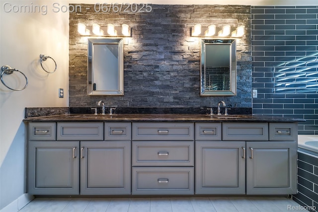42105 Dorchester Ct, Clinton Township, MI 48038 - bathroom featuring double vanity and a bathtub