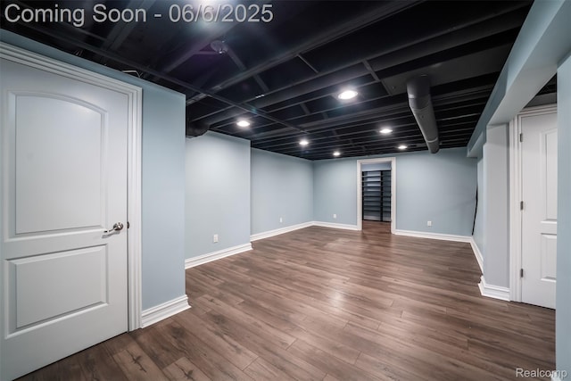 42105 Dorchester Ct, Clinton Township, MI 48038 - finished basement featuring wood finished floors and baseboards